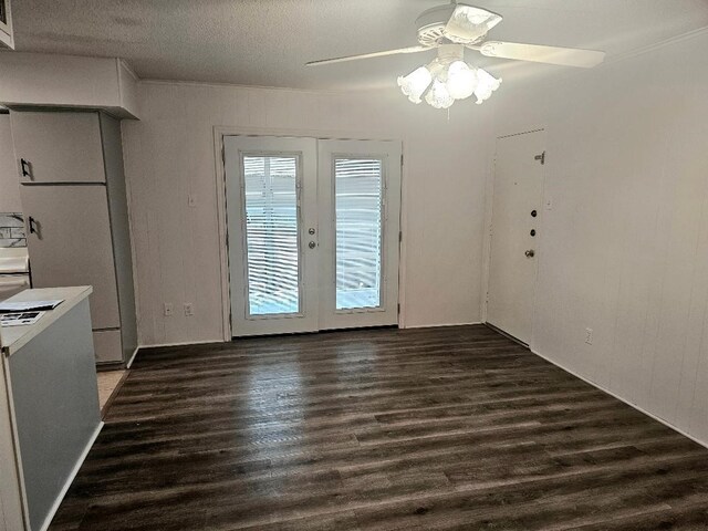 5825 Birchbrook Dr Unit 106, Dallas, TX 75206 - unfurnished dining area with ceiling fan and wood finished floors