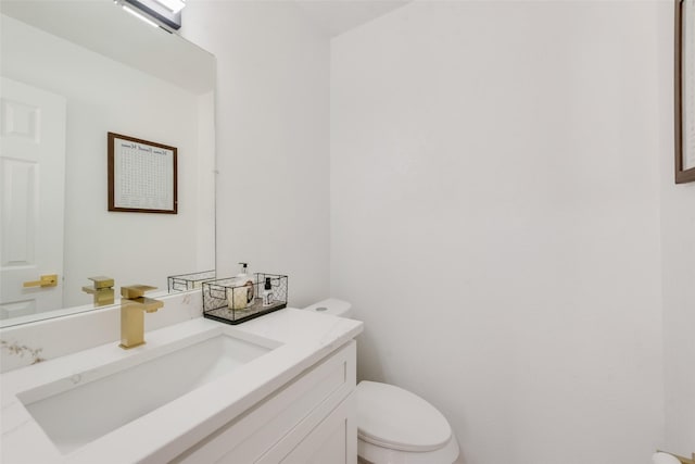 half bath with toilet and vanity