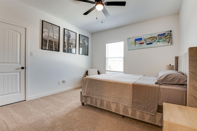 bedroom featuring carpet floors, ceiling fan, and baseboards