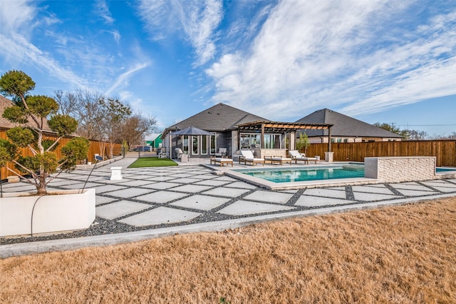 view of swimming pool with a patio, fence, a fenced in pool, and a pergola