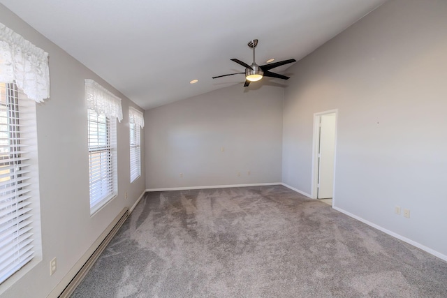 carpeted spare room with a baseboard heating unit, baseboards, vaulted ceiling, recessed lighting, and a ceiling fan