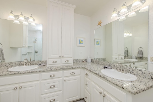 full bathroom featuring vanity and a stall shower