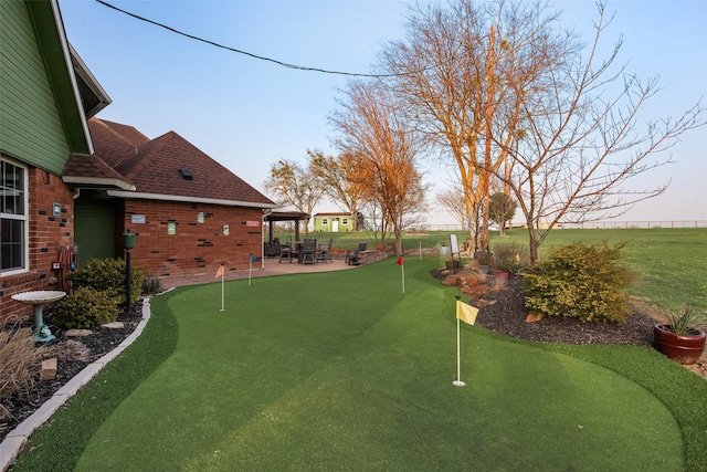 view of yard with a patio area