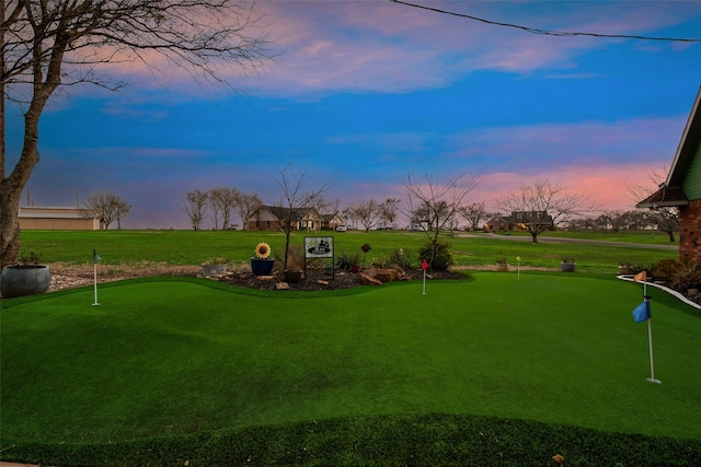 surrounding community featuring a yard