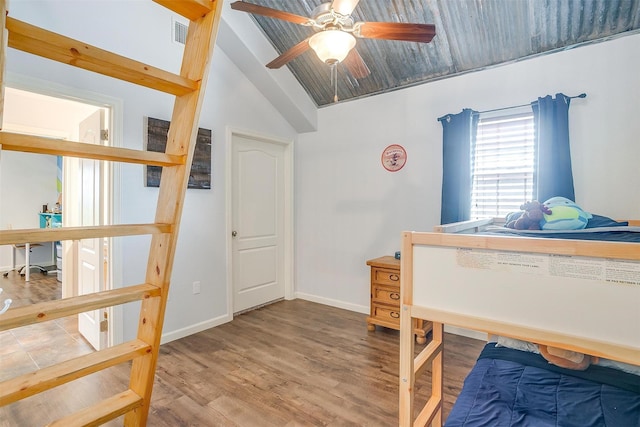 399 Brindley Rd, Maypearl, TX 76064 - bedroom featuring lofted ceiling, baseboards, ceiling fan, visible vents, and wood finished floors