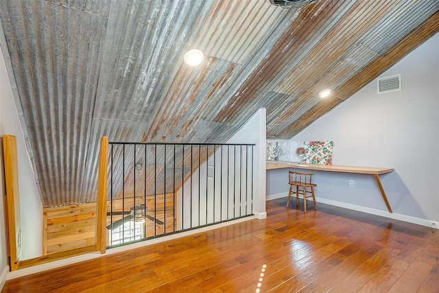 399 Brindley Rd, Maypearl, TX 76064 - bonus room featuring baseboards, hardwood / wood-style floors, visible vents, and vaulted ceiling