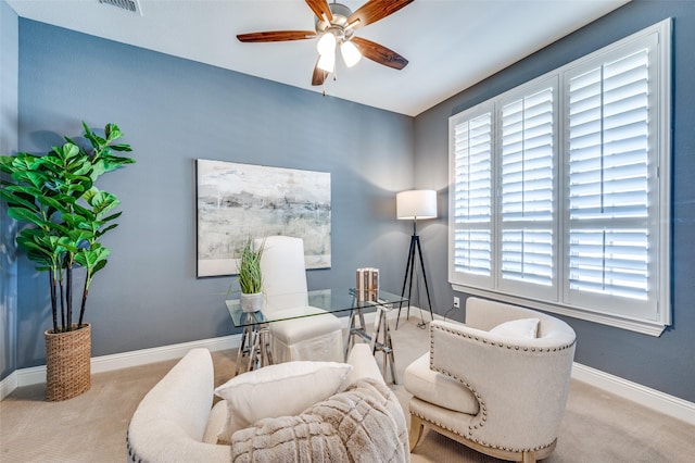 home office featuring ceiling fan, carpet flooring, visible vents, and baseboards