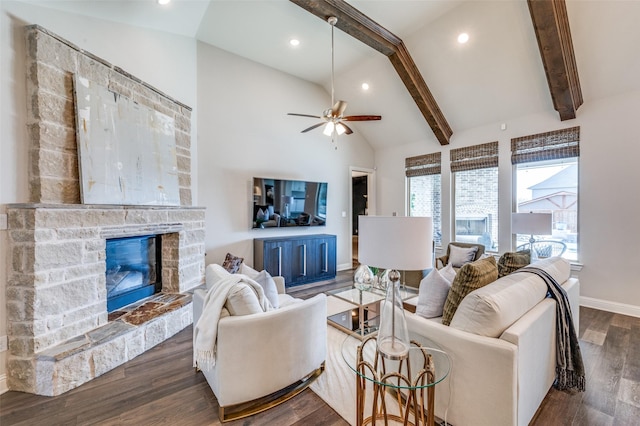 living room featuring beam ceiling, a fireplace, recessed lighting, wood finished floors, and baseboards