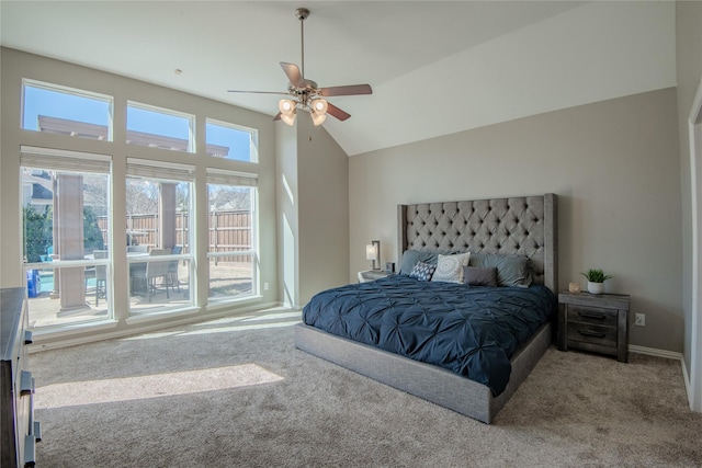 carpeted bedroom with high vaulted ceiling, baseboards, and ceiling fan