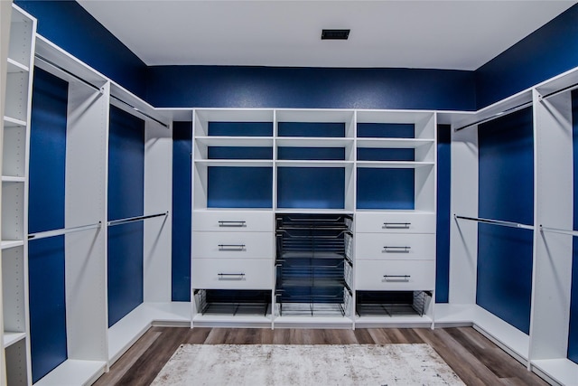 spacious closet featuring wood finished floors