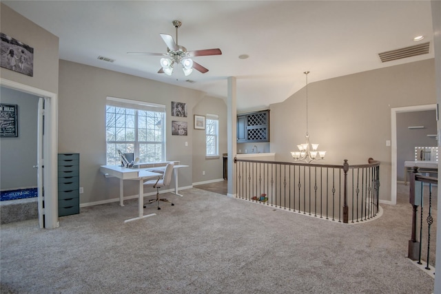 carpeted home office featuring visible vents, ceiling fan with notable chandelier, and baseboards