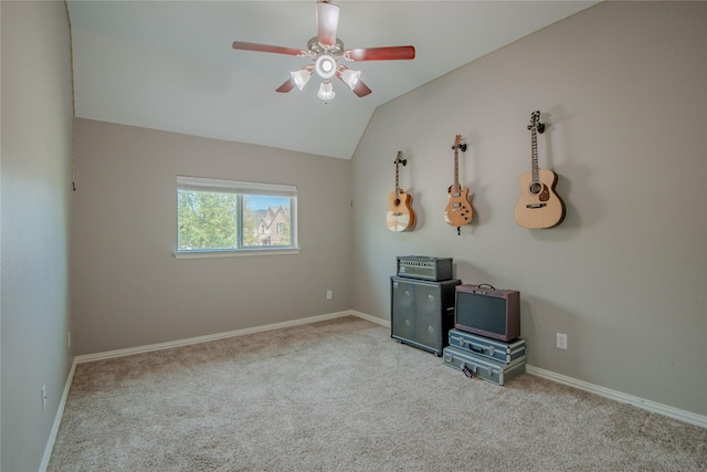 playroom with baseboards, carpet, lofted ceiling, and a ceiling fan