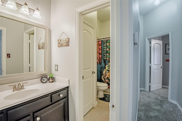 bathroom featuring vanity, toilet, a shower with curtain, and tile patterned flooring