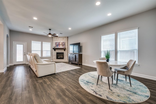 1121 Ash St, Celina, TX 75009 - living room featuring baseboards, visible vents, dark wood-style flooring, a fireplace, and recessed lighting