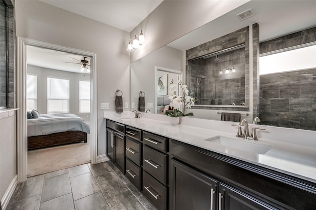 1121 Ash St, Celina, TX 75009 - bathroom with connected bathroom, visible vents, a sink, and double vanity