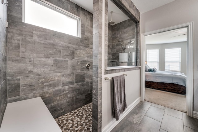 1121 Ash St, Celina, TX 75009 - full bath with a walk in shower, baseboards, connected bathroom, and a healthy amount of sunlight