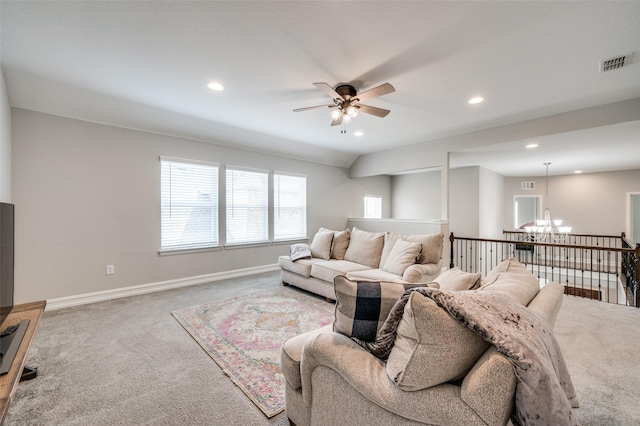 1121 Ash St, Celina, TX 75009 - living area with recessed lighting, baseboards, visible vents, carpet flooring, and ceiling fan with notable chandelier