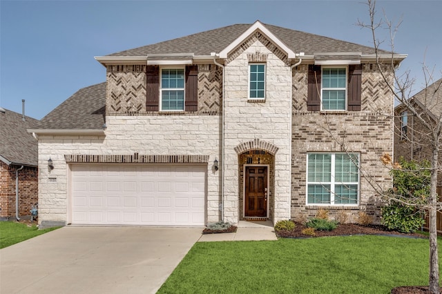 view of front of property with driveway, stone siding, a shingled roof, and a front yard