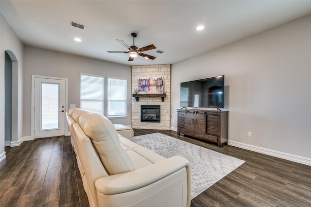 1121 Ash St, Celina, TX 75009 - living room featuring recessed lighting, dark wood-style flooring, a fireplace, visible vents, and baseboards