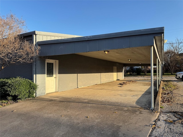 exterior space with an attached carport