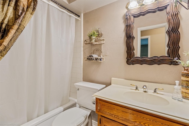 full bath with toilet, a textured wall, shower / bath combo with shower curtain, and vanity