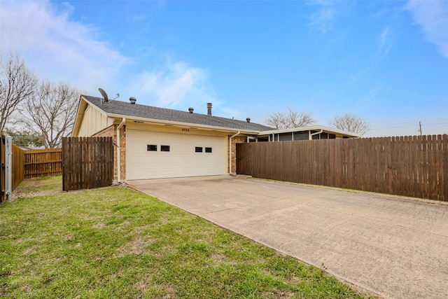 view of side of home featuring a garage, driveway, fence, and brick siding