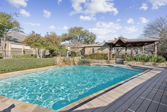 view of pool featuring a gazebo, a fenced in pool, and fence