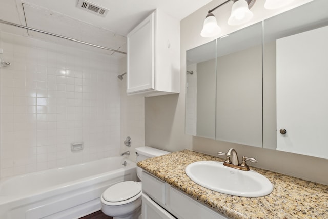 full bath with vanity, toilet, tub / shower combination, and visible vents