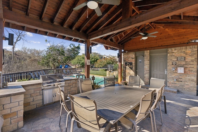 view of patio / terrace featuring grilling area, a fenced in pool, ceiling fan, outdoor dining space, and area for grilling