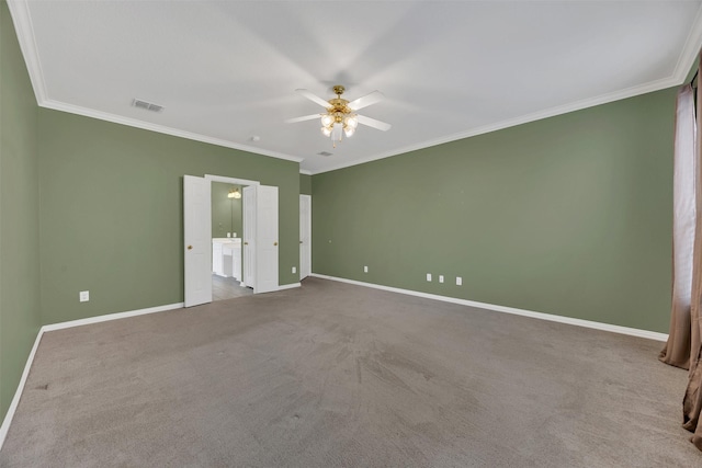 unfurnished bedroom with ornamental molding, carpet, visible vents, and baseboards