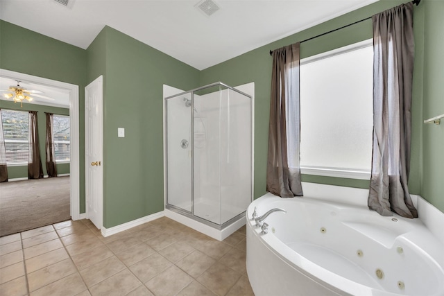 full bath featuring visible vents, a shower stall, a whirlpool tub, baseboards, and tile patterned floors