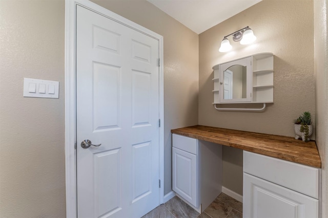 bathroom featuring baseboards