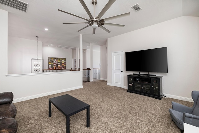 living area with carpet, visible vents, and baseboards