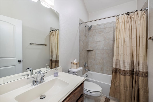 bathroom featuring shower / tub combo, vanity, and toilet