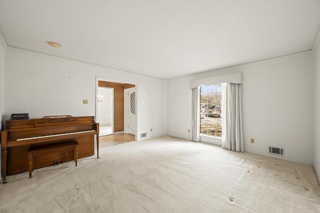 sitting room featuring carpet and visible vents