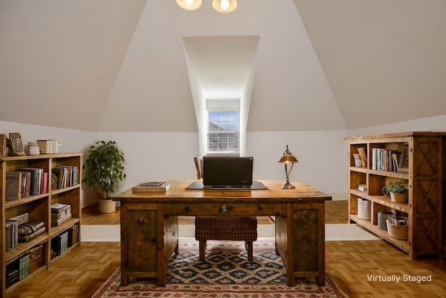 home office featuring vaulted ceiling