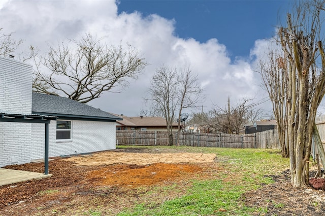 view of yard with fence