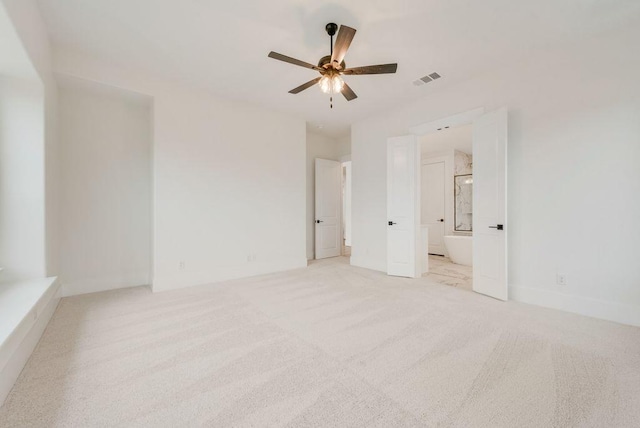 1813 Cousins Trl, Frisco, TX 75034 - unfurnished bedroom with light carpet, connected bathroom, and a ceiling fan