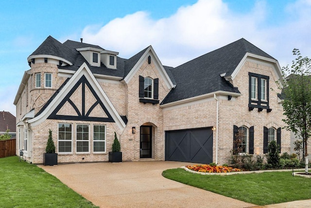 1813 Cousins Trl, Frisco, TX 75034 - view of front of property featuring driveway, roof with shingles, brick siding, and an attached garage