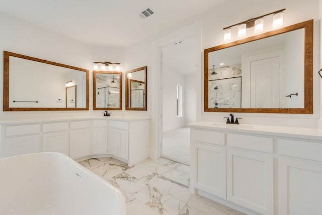 bathroom with marble finish floor, visible vents, a freestanding tub, and a marble finish shower