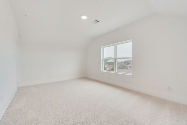 bonus room with light carpet, baseboards, visible vents, lofted ceiling, and recessed lighting