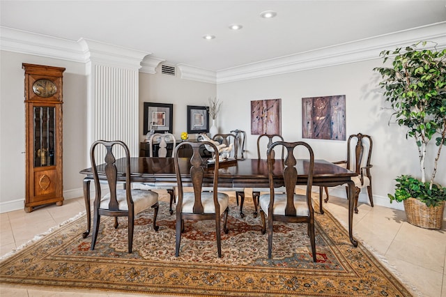 dining room with light tile patterned floors, baseboards, crown molding, and recessed lighting