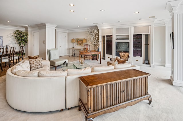 living room featuring recessed lighting, light carpet, visible vents, decorative columns, and crown molding