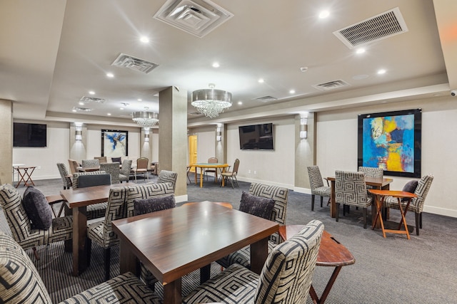 carpeted dining room with visible vents and recessed lighting