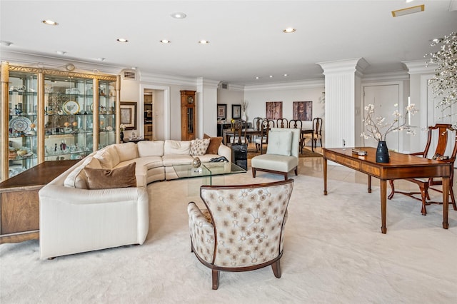 living room with crown molding, decorative columns, and recessed lighting