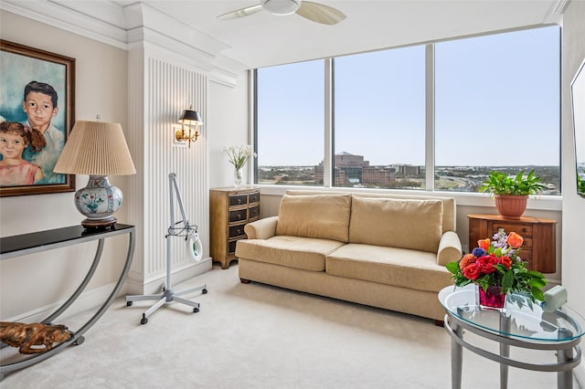 sunroom with a city view and ceiling fan