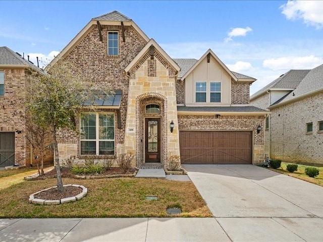 3408 Calico Dr, Irving, TX 75038 - view of front facade with driveway, a shingled roof, stone siding, an attached garage, and brick siding