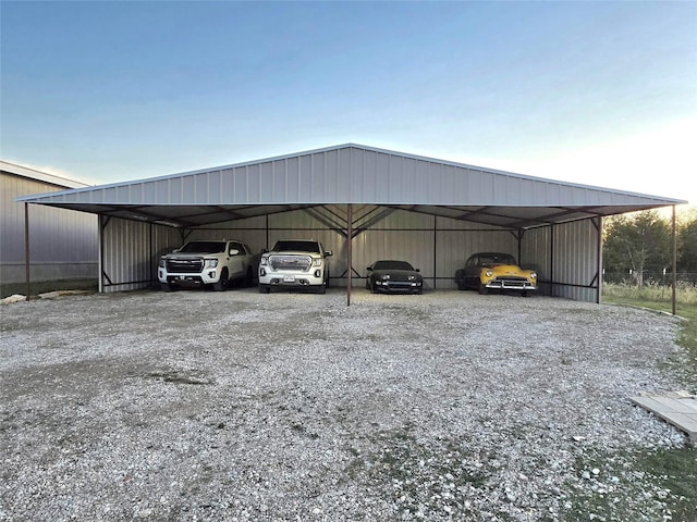 view of parking / parking lot featuring a detached carport