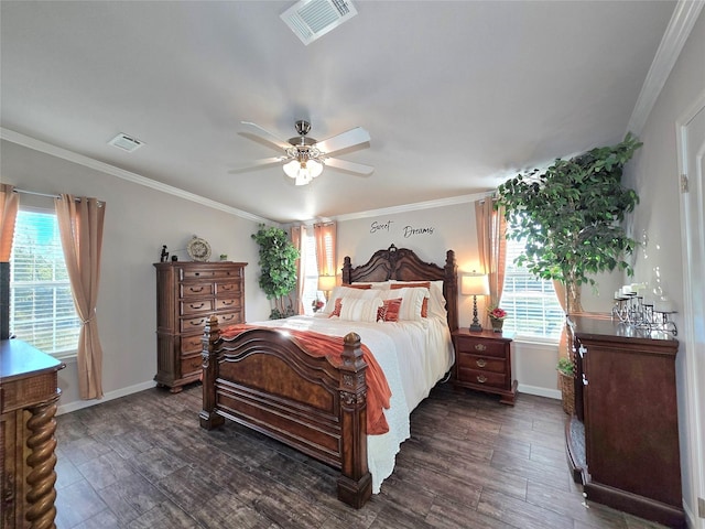 bedroom with visible vents, ornamental molding, and dark wood finished floors