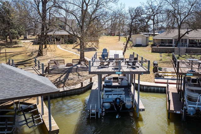 view of dock with a water view and boat lift